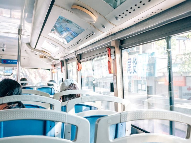 Minimalist interior with natural sunlight streaming through a window.