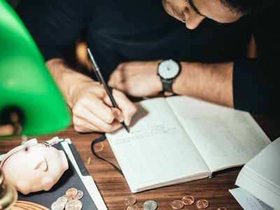 Soft focus on a wooden desk with a notebook.
